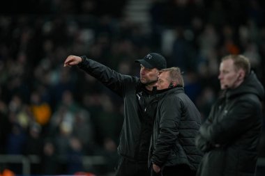 John Eustace manager of Derby County speaks with a member of his coaching team during the Sky Bet Championship match Derby County vs Middlesbrough at Pride Park Stadium, Derby, United Kingdom, 1st January 2026