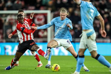 Nordi Mukiele of Sunderland dispossesses Erling Haland of Manchester City during the Premier League match Sunderland vs Manchester City at Stadium Of Light, Sunderland, United Kingdom, 1st January 2026