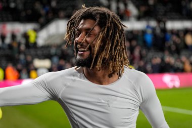 Dion Sanderson of Derby County celebrates with the fans at full time and gives a fan his shirt after his team won 1-0 during the Sky Bet Championship match Derby County vs Middlesbrough at Pride Park Stadium, Derby, United Kingdom, 1st January 2026