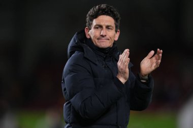 Keith Andrews manager of Brentford applauds home support during the Premier League match Brentford vs Tottenham Hotspur at The Gtech Community Stadium, London, United Kingdom, 1st January 2026