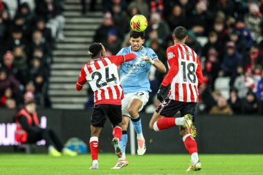 Matheus Nunes of Manchester City jumps up to win the high ball during the Premier League match Sunderland vs Manchester City at Stadium Of Light, Sunderland, United Kingdom, 1st January 2026