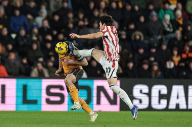 Lewis Coyle of Hull City is fouled bu Bae Jun-Ho of Stoke City during the Sky Bet Championship match Hull City vs Stoke City at MKM Stadium, Hull, United Kingdom, 1st January 2026