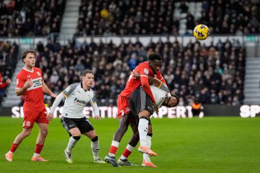 Rhian Brewster of Derby County battles for the ball with Alex Bangura of Middlesbrough during the Sky Bet Championship match Derby County vs Middlesbrough at Pride Park Stadium, Derby, United Kingdom, 1st January 2026