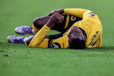 Yerson Mosquera of Wolverhampton Wanderers goes down with an injury during the Premier League match Wolverhampton Wanderers vs West Ham United at Molineux, Wolverhampton, United Kingdom, 3rd January 2026