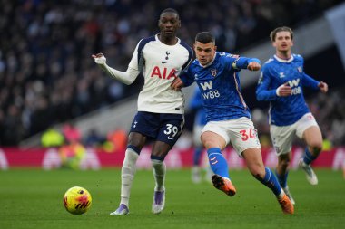 Randal Kolo Muani of Tottenham Hotspur and Granit Xhaka of Sunderland during the Premier League match Tottenham Hotspur vs Sunderland at Tottenham Hotspur Stadium, London, United Kingdom, 4th January 2026
