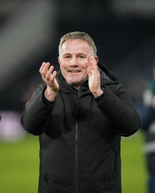 Wrexham manager Phil Parkinson applauds the fans after the final whistle during the Sky Bet Championship match Derby County vs Wrexham at Pride Park Stadium, Derby, United Kingdom, 4th January 2026