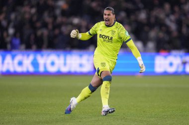 West Ham United takımından Alphonse Areola, 6 Ocak 2026 'da Londra Stadyumu' nda oynanan Premier League maçında West Ham United ve Nottingham Forest maçını kutluyor.
