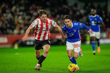 Brentford Premier Ligi karşılaşmasında Brentford 'a karşı Sunderland, Londra' daki Gtech Community Stadyumu 'nda 7 Ocak 2026 tarihinde oynanan Yehor Yarmolyuk maçında Sunderland' dan Enzo Le Fee ile top mücadelesi verilmiştir.