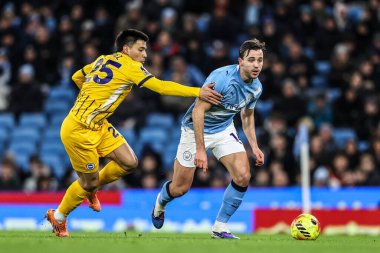 Brighton & Hove Albion 'dan Diego Gomez ve Manchester City' den Nico Gonzalez Premier Lig karşılaşmasında Manchester City ile Brighton ve Hove Albion 'a karşı Etihad Stadyumu, Manchester, İngiltere, 7 Ocak 2026