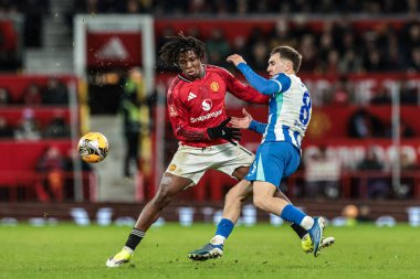 Brighton 'dan Patrick Dorgu ve Brighton' dan Brajan Gruda, 11 Ocak 2026 'da Old Trafford, Manchester, İngiltere' de oynanan ve Manchester United ve Hove Albion 'a karşı oynanan üçüncü tur karşılaşmasında top için Hove Albion mücadele etti.