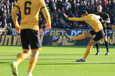 Joao Gomes of Wolverhampton Wanderers shoots on goal but its saved by Elyh Harrison of Shrewsbury Town during the Emirates FA Cup Third Round match Wolverhampton Wanderers vs Shrewsbury Town at Molineux, Wolverhampton, United Kingdom, 10/01/2026