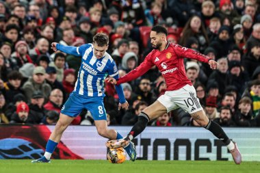 Brighton & Hove Albion 'dan Brajan Gruda ve Manchester United' ın Brighton ve Hove Albion 'a karşı oynadığı 11 Ocak 2026 tarihli üçüncü tur müsabakasında Manchester Unteus Cunha top için mücadele etti.