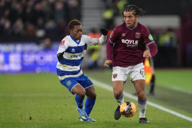 West Ham United 'dan Ezra Mayers ve Queens Park Rangers' dan Karamoko Dembl, 11 Ocak 2026 'da Londra Stadyumu, İngiltere' de oynanan ve Queens Park Rangers 'a karşı oynanan üçüncü tur müsabakalarında