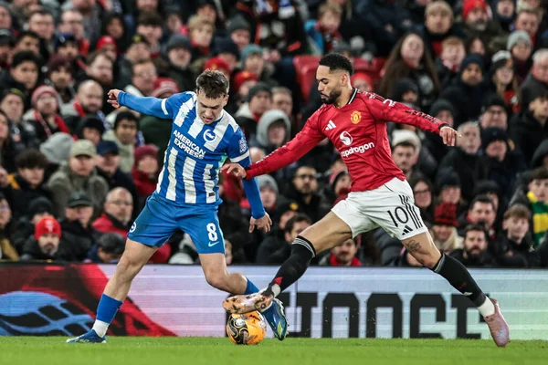 Brighton & Hove Albion 'dan Brajan Gruda ve Manchester United' ın Brighton ve Hove Albion 'a karşı oynadığı 11 Ocak 2026 tarihli üçüncü tur müsabakasında Manchester Unteus Cunha top için mücadele etti.