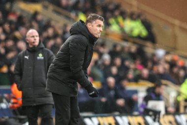 Wolverhampton Wanderers 'ın Rob Edwards teknik direktörü, 18 Ocak 2026' da İngiltere 'nin Wolverhampton kentinde oynanan Premier League maçında Wolverhampton Wanderers - Newcastle United maçına bakıyor.
