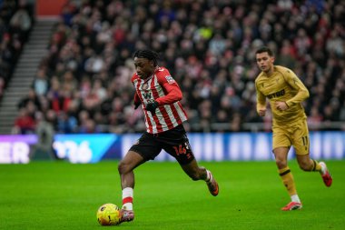 Sunderland 'dan Romaine Mundle, Premier League maçında topu Sunderland' a karşı Crystal Palace Stadyumu, Sunderland, İngiltere 'de 17 Ocak 2026' da koştu.