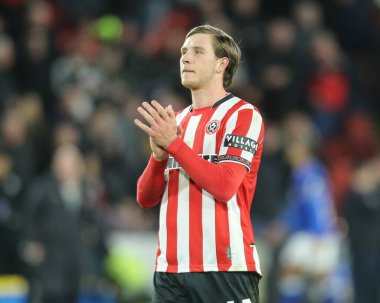 Sheffield United takımından Sydie Peck, 24 Ocak 2026 'da İngiltere' nin Sheffield kentinde oynanan ve Sheffield United 'ın Ipswich Town' a karşı oynadığı maçtaki son ıslık çaldıktan sonra taraftarları alkışlıyor.