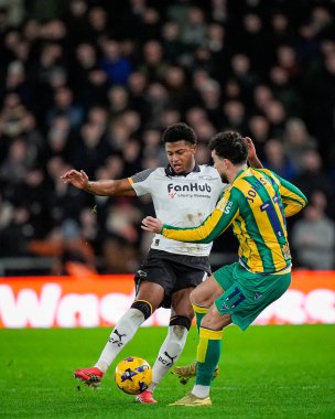 Derby County 'den Rhian Brewster, West Bromwich Albion takımından Mikey Johnston ile birlikte 23 Ocak 2026' da İngiltere 'nin Pride Park Stadyumu' nda oynanan Sky Bet Şampiyonası maçında Batı Bromwich Albion 'a karşı mücadele etti.