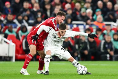 Qarabag FK takımından Joni Montiel, 28 Ocak 2026 tarihinde Anfield, Liverpool, İngiltere 'de oynanan 8 maçta Liverpool - Qarabag FK maçında Liverpool Ligi Ligi' nden Alexis Mac Allister 'ın formasını giydi.