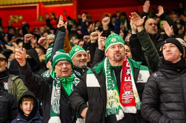 Ferencvaros taraftarları, 29 Ocak 2026 'da İngiltere' nin Nottingham şehrinde oynanan 8 Nottingham Ormanı-Ferencvaros maçında UEFA Avrupa Ligi Maçı öncesinde bayraklar ve bayraklarla karşılaşacaklar.