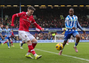 Wrexham 'dan Josh Windass 31 Ocak 2026' da İngiltere 'nin başkenti Hillsborough' da oynanan Sheffield Wednesday-Wrexham maçında topu geçiyor.