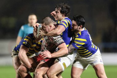 Warrington Wolves takımından James Bentley, Leigh Leopards 'dan AJ Towse' u 30 Ocak 2026 'da Halliwell Jones Stadyumu' nda oynanan Pre Season maçında yendi.