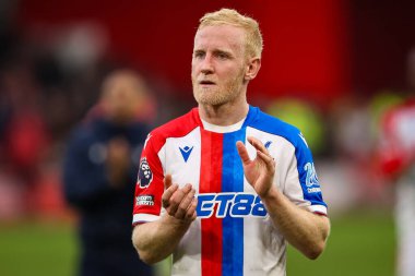 Kristal Saray 'dan Will Hughes, İngiltere' nin Nottingham şehrinde 1 Şubat 2026 'da oynanan Premier Lig maçı sırasında oynanan Nottingham Forest - Crystal Palace maçında taraftarları alkışlıyor.