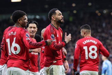 Manchester United takımından Matheus Cunha, Manchester United 'ın 1 Şubat 2026' da Old Trafford, Manchester 'da oynadığı Premier League maçında 2-0' lık galibiyet golünü kutluyor.