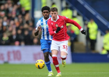 Wrexham 'dan Nathan Broadhead, 31 Ocak 2026' da Sheffield Wednesday-Wrexham maçında topu düşürüyor.