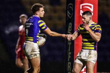 Warrington Wolves takımından Cai Taylor-Wray, 6 Şubat 2026 'da İngiltere' nin Warrington kentinde oynanan Betfred Challenge Cup karşılaşmasında Warrington Wolves ve Sheffield Eagles maçını kutluyor.