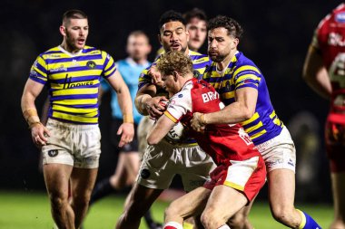 Warrington Wolves 'tan Kelepi Tanginoa ve Warrington Wolves' tan Toby King, 6 Şubat 2026 'da İngiltere' nin Warrington kentinde bulunan Halliwell Jones Stadyumu 'nda oynanan Betfred Challenge Cup karşılaşmasında karşı karşıya geldiler.