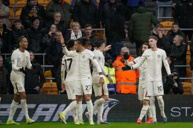 Chelsea 'den Cole Palmer, Premier League maçında Wolverhampton Wanderers Chelsea' ye karşı 7 Şubat 2026 tarihinde Wolverhampton, İngiltere 'de oynanan maçta 0-3' lük galibiyet golünü kutluyor.