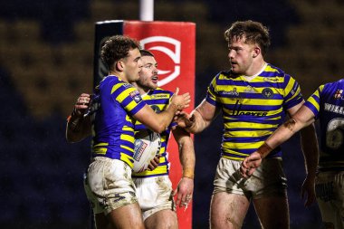 Warrington Wolves takımından Cai Taylor-Wray, 6 Şubat 2026 'da İngiltere' nin Warrington kentinde oynanan Betfred Challenge Cup karşılaşmasında Warrington Wolves ve Sheffield Eagles maçını kutluyor.
