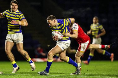Warrington Wolves takımından Ben Currie, 6 Şubat 2026 'da İngiltere' nin Warrington kentinde oynanan The Halliwell Jones Stadyumu 'nda oynanan Warrington Wolves-Sheffield Eagles maçında yenildi.