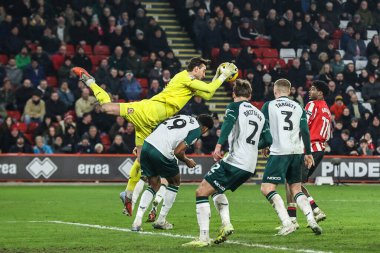 Middlesbrough kalecisi Sol Brynn, 9 Şubat 2026 tarihinde İngiltere 'nin Sheffield Lane kentindeki Bramall Lane' de oynanan Gökyüzü İddia Şampiyonası maçında yüksek topu kazanmak için sıçradı.