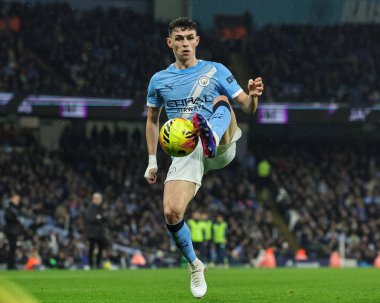 Manchester City 'den Phil Foden, 11 Şubat 2026' da Etihad Stadyumu 'nda oynanan Premier League maçında topu kontrol ediyor.