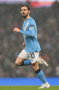 Manchester City 'den Bernardo Silva, 11 Şubat 2026 tarihinde Etihad Stadyumu' nda Manchester City Fulham 'a karşı oynanan Premier League maçı sırasında hareket halindeydi.
