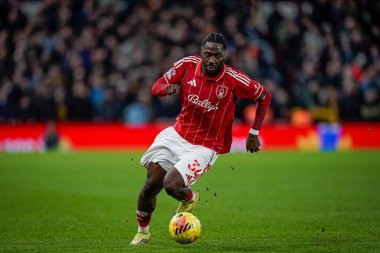 Nottingham Ormanı 'ndan Ola Aina, İngiltere' nin Nottingham şehrinde 11 Şubat 2026 tarihinde oynanan Premier League maçında Nottingham Forest 'a karşı Wolverhampton Wanderers maçında topla koşuyor.