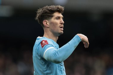 Manchester City 'den John Stones, 14 Şubat 2026 tarihinde İngiltere' nin Etihad Stadyumu 'nda oynanan 4.