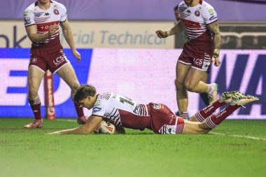 Sam Walters of Wigan Warriors goes over for a try during the Betfred Super League match Wigan Warriors vs Hull FC at The Brick Community Stadium, Wigan, United Kingdom on 21 February 2026