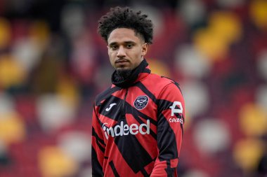 Brentford 'dan Kevin Schade, 21 Şubat 2026 tarihinde İngiltere' nin GTECH Community Stadyumu 'nda oynanan Premier League karşılaşmasında Brentford - Brighton & Hove Albion maçında ısınma turunda