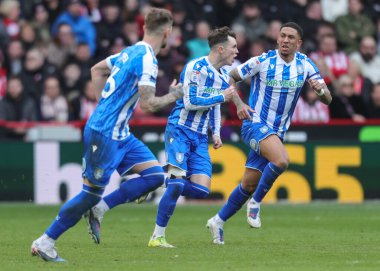 Sheffield Wednesday 'den Charlie McNeill, 22 Şubat 2026' da İngiltere 'nin Sheffield kentindeki Bramall Lane' de Sheffield United ile Sheffield Çarşamba günü oynanan Sky Bet Şampiyonası maçında 2-1 kazanma hedefini kutluyor.