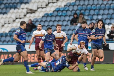 Huddersfield Giants 'dan George Flanagan Jnr, 22 Şubat 2026' da İngiltere 'nin Huddersfield Stadyumu' nda oynanan Betfred Süper Lig karşılaşmasında Wakefield Giants 'a karşı Wakefield Trinity' yi denemek için Wakefield Trinity 'ye gidiyor.