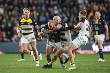 Leeds Rhinos takımından Jarrod O 'Connor, 20 Şubat 2026 tarihinde İngiltere' nin Leeds Stadyumu 'nda oynanan Betfred Süper Lig karşılaşmasında Jordan Thompson ve Oli Field of York Knights tarafından yenildi.