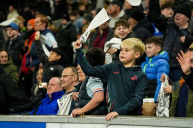 Swansea City taraftarları 24 Şubat 2026 'da İngiltere' nin Swansea.com Stadyumu 'nda Swansea City ve Preston North End arasındaki Sky Bet Şampiyonası maçını kutluyorlar.