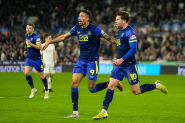 Preston North End 'den Daniel Jebbison 24 Şubat 2026' da İngiltere 'nin Swansea.com Stadyumu' nda oynanan Sky Bet Şampiyonası maçında takımının ilk golünü atmasını kutluyor.