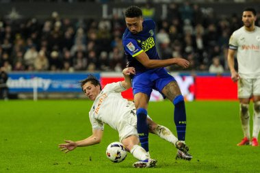 Preston North End 'den Daniel Jebbison, 24 Şubat 2026 tarihinde Swansea.com Stadyumu, Swansea.com, Birleşik Krallık' ta oynanan Sky Bet Şampiyonası karşılaşmasında Swansea City 'li Goncalo Franco tarafından yenildi.