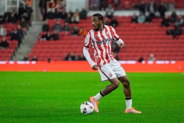 Stoke City 'den Eric Bocat, Stoke City' nin Oxford United 'a karşı oynadığı 25 Şubat 2026' da Bet365 Stadyumu 'nda oynanan Sky Bet Şampiyonası maçında topu kontrol ediyor.