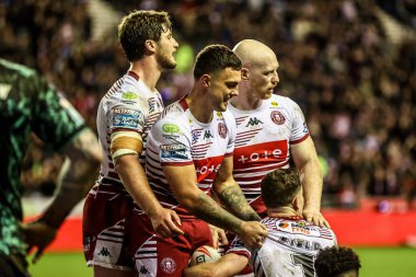 Wigan Warriors 'dan Jai Field, 26 Şubat 2026' da İngiltere 'nin Wigan şehrindeki Brick Community Stadyumu' nda oynanan Betfred Süper Lig karşılaşmasında denemesini kutluyor.