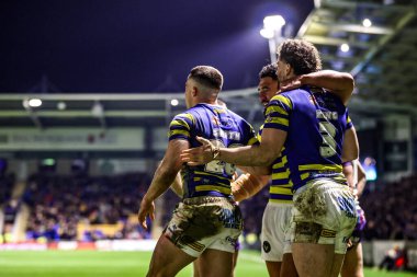 Warrington Wolves takımından Josh Smith, 28 Şubat 2026 'da İngiltere' nin Warrington kentinde oynanan Betfred Süper Lig 3. Raundunda Warrington Wolves vs Wakefield Trinity maçında denemesini kutluyor.